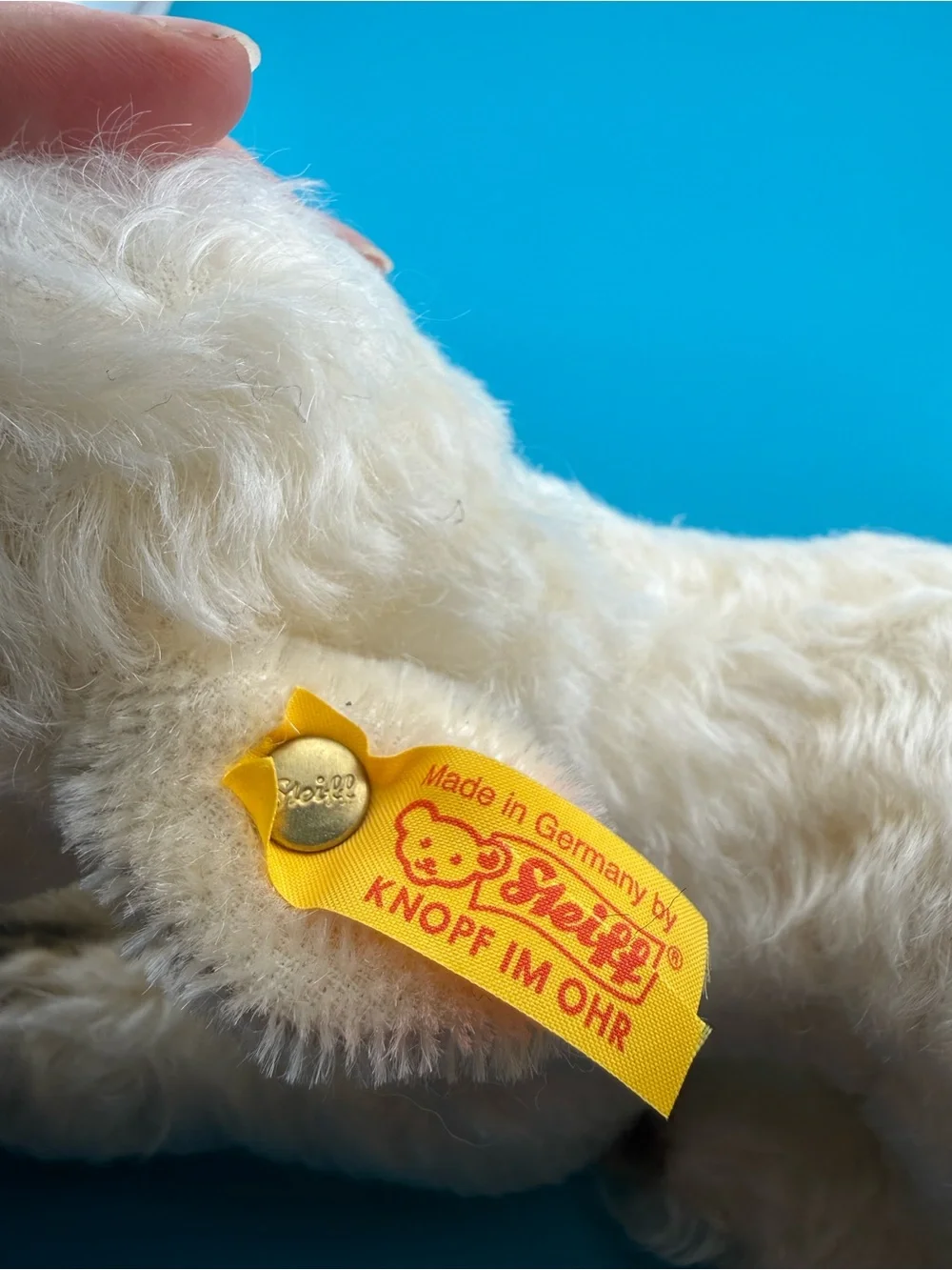 Cream Plush Lamb with Brown Hoof Accents and Yellow Ear Ribbon